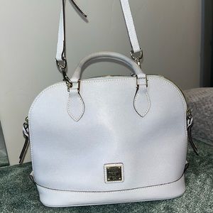 Light grey “Zip Zip Satchel” from Dooney & Bourke.